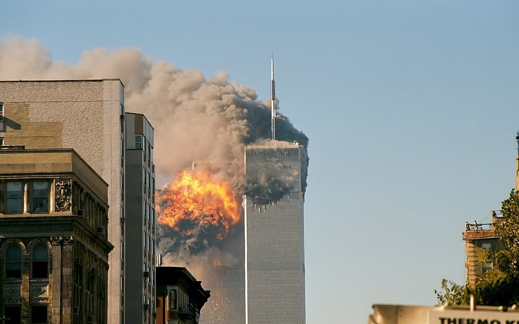 United Airlines Flight 175 crashes into the south tower of the World Trade Center complex in New York City during the September 11 attacks (Photo/Robert J. Fisch via CC BY-SA 2.0)