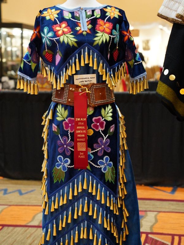 An award winning decorated jingle dress in the diverse arts category at the 101st Santa Fe Indian Art Market. 