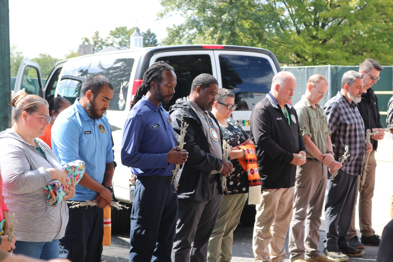 Carlisle Main Post Cemetery staff and Office of Army Cemetery staff with the sage they’ve just received from tribal members in Tuesday’s transfer ceremony. (Photo:Jenna Kunze)