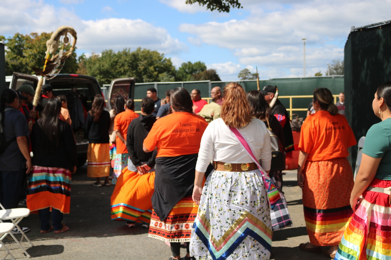 The final moments of Tuesday’s dignified transfer ceremony, where tribal members from the Sisseton Wahpeton Oyate and Spirit Lake Nations welcomed their relatives into the vehicle that would take them home for reburial. (Photo: Jenna Kunze)