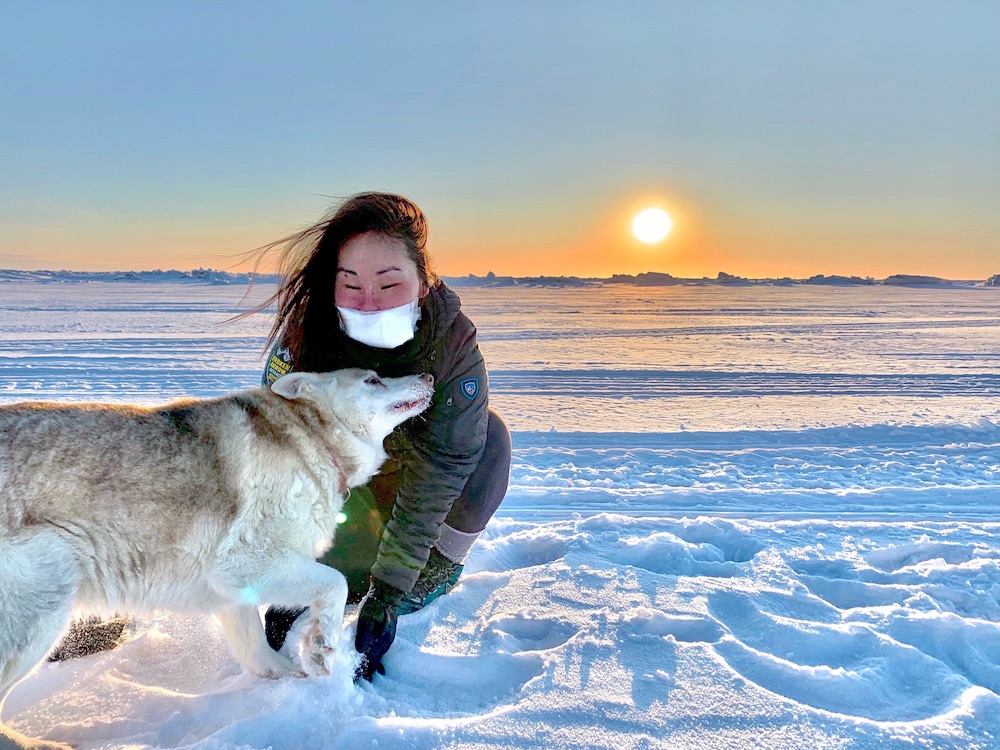 Carol with her dog, Solar, in Nome, Alaska.  (Photo: Courtesy of Carol Seppilu)