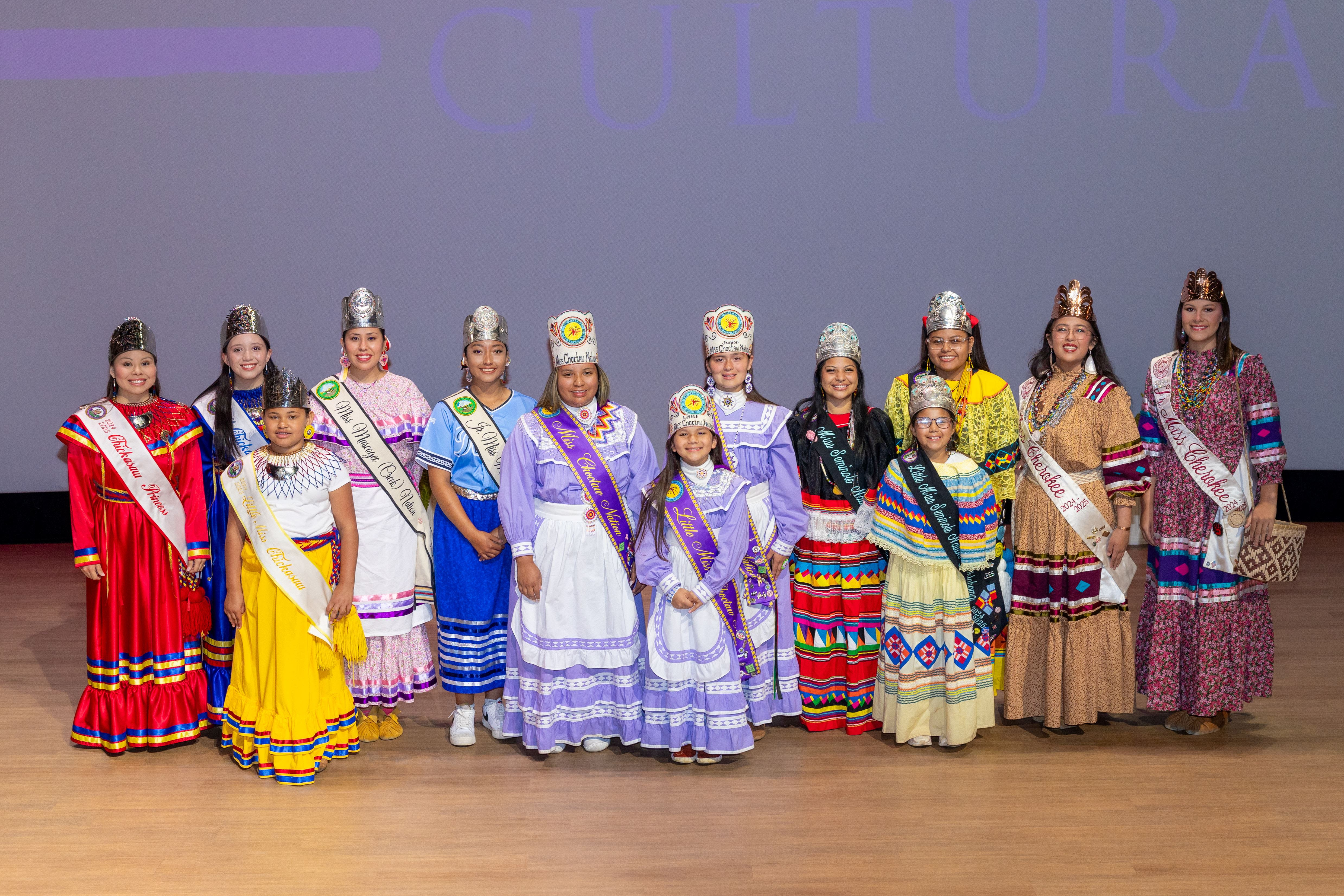 Royalty from the Cherokee, Chickasaw, Choctaw, Muscogee and Seminole Nations gathered at the Chickasaw Cultural Center in May for a “Princess Workshop” to learn more about each tribe’s histories. From left, Chickasaw Princess Cheyanne Arkansas, Chickasaw Junior Princess Channa Greenwood, Little Miss Chickasaw Eliorah Wright, Miss Muscogee Nation Janaya McIntosh, Junior Miss Muscogee Nation Olivia Beaver, Senior Miss Choctaw Melea Jefferson, Little Miss Choctaw Ava Davenport, Junior Miss Choctaw Daryan Eubanks, Miss Seminole Nation Adyson Beaver, Little Miss Seminole Nation Emilia Wise, Junior Miss Seminole Nation Annalees Martinez, Miss Cherokee Ella Mounce and Junior Miss Cherokee Dayci Starr. (Photo/Chickasaw Nation)