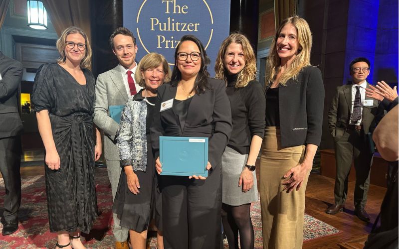 Connie Walker and her team accepting the 2023 Pulitzer Prize in audio reporting. “Podcasting is a team sport,” Walker said. (courtesy photo)