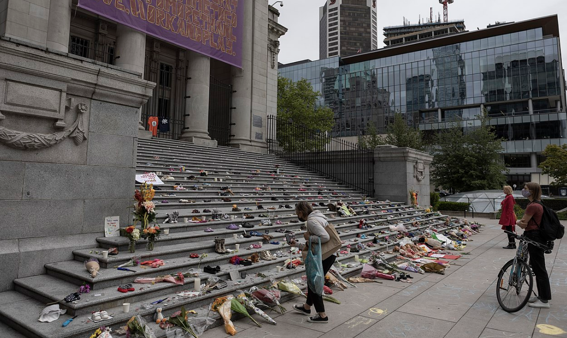 A memorial honoring the 215 children whose remains were found on the former site of the Kamloops Indian Residential School on the steps of the Vancouver Art Gallery. (Photo credit: GoToVan)
