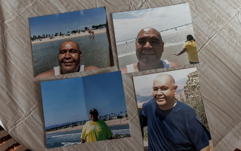 Photos of Jeffrey Hustito at the beach in California (top row and bottom left) and the Grand Canyon in Arizona (bottom right), photographed on the Hustitos’ dining room table in Zuni Pueblo. (photo/Adriana Zehbrauskas, special to ProPublica)