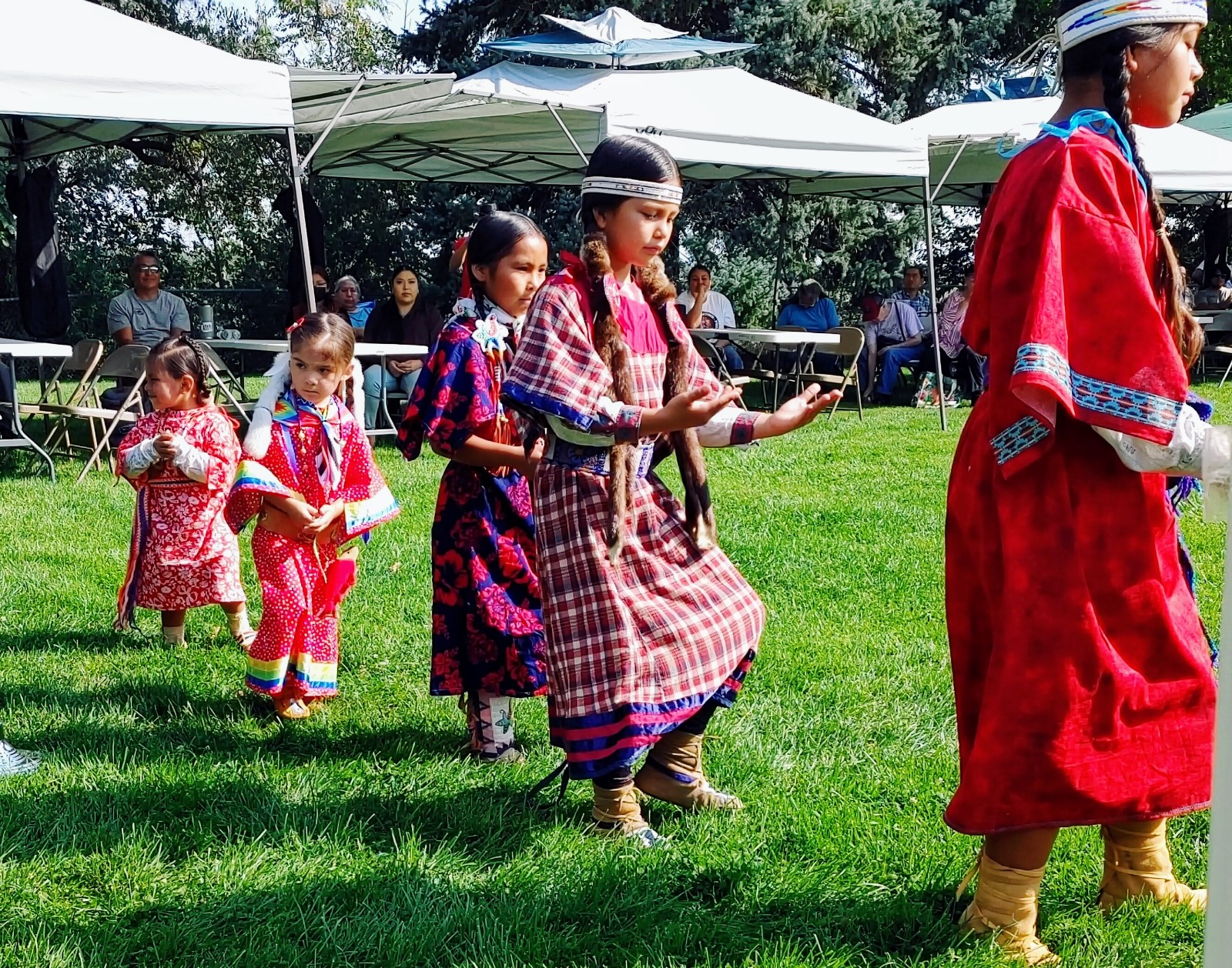 Members of the Yakama Nation gathered Friday at the Wye Park in Richland near Bateman Island to advocate for salmon. They are calling for immediate removal of the earthen causeway to the island, which reduces water flow and increases water temperatures and sediment, fostering invasive plants and predatory fish. (photo/Yakama Nation)