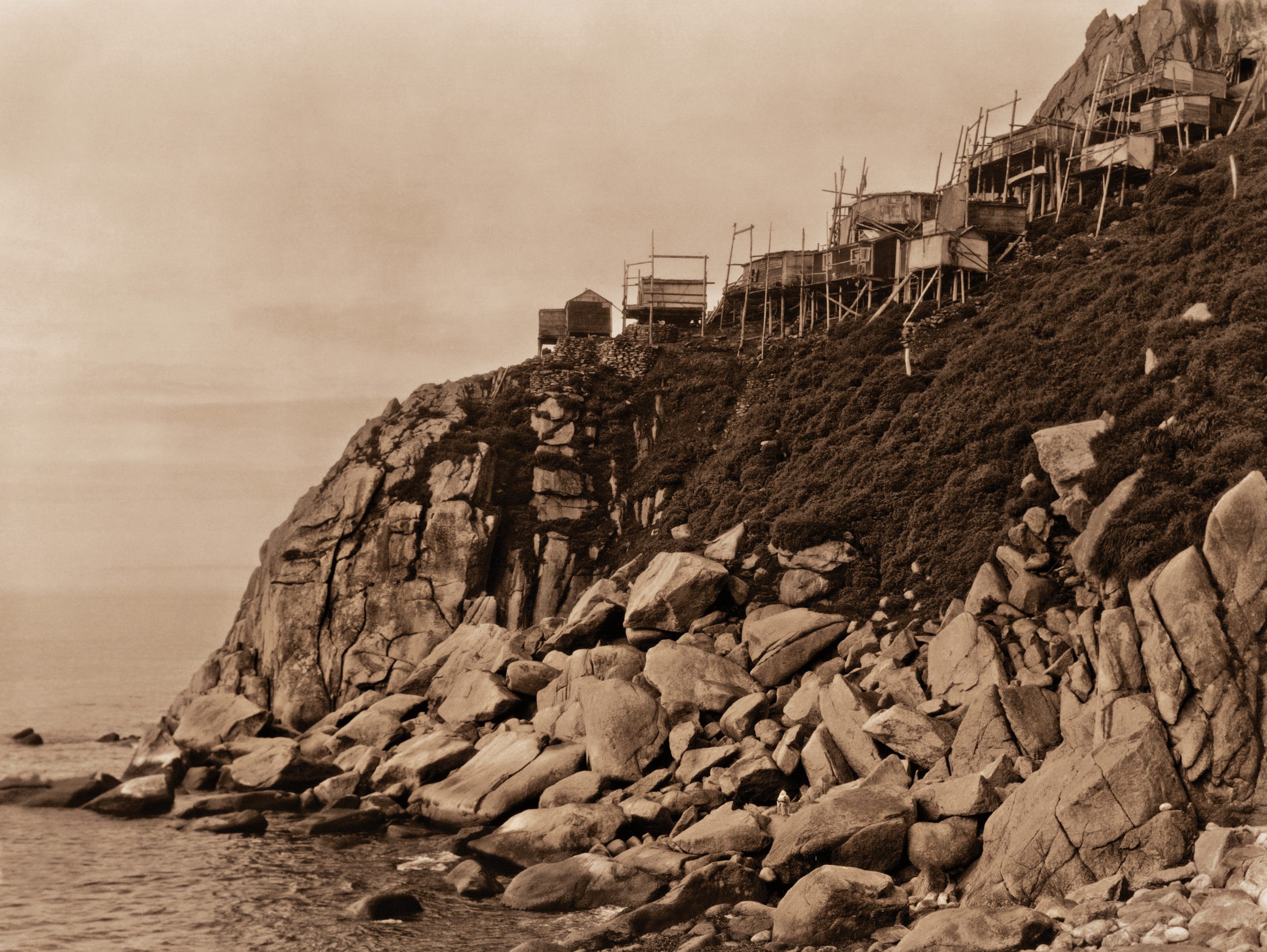 Native houses on stilts on Alaska's King Island. (Photo/Courtesy of the Curtis Legacy Foundation)