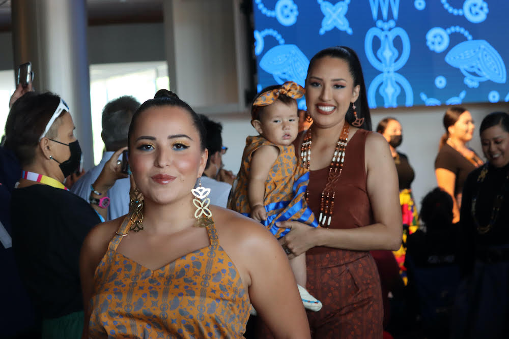 Shaina Nizhone Snyder and Erica Pretty Eagle Moore participate in one of the fashion shows during the grand opening of the First Americans Museum in Oklahoma City on Sunday, September 19, 2021. (Photo/Darren Thompson for Native News Online)