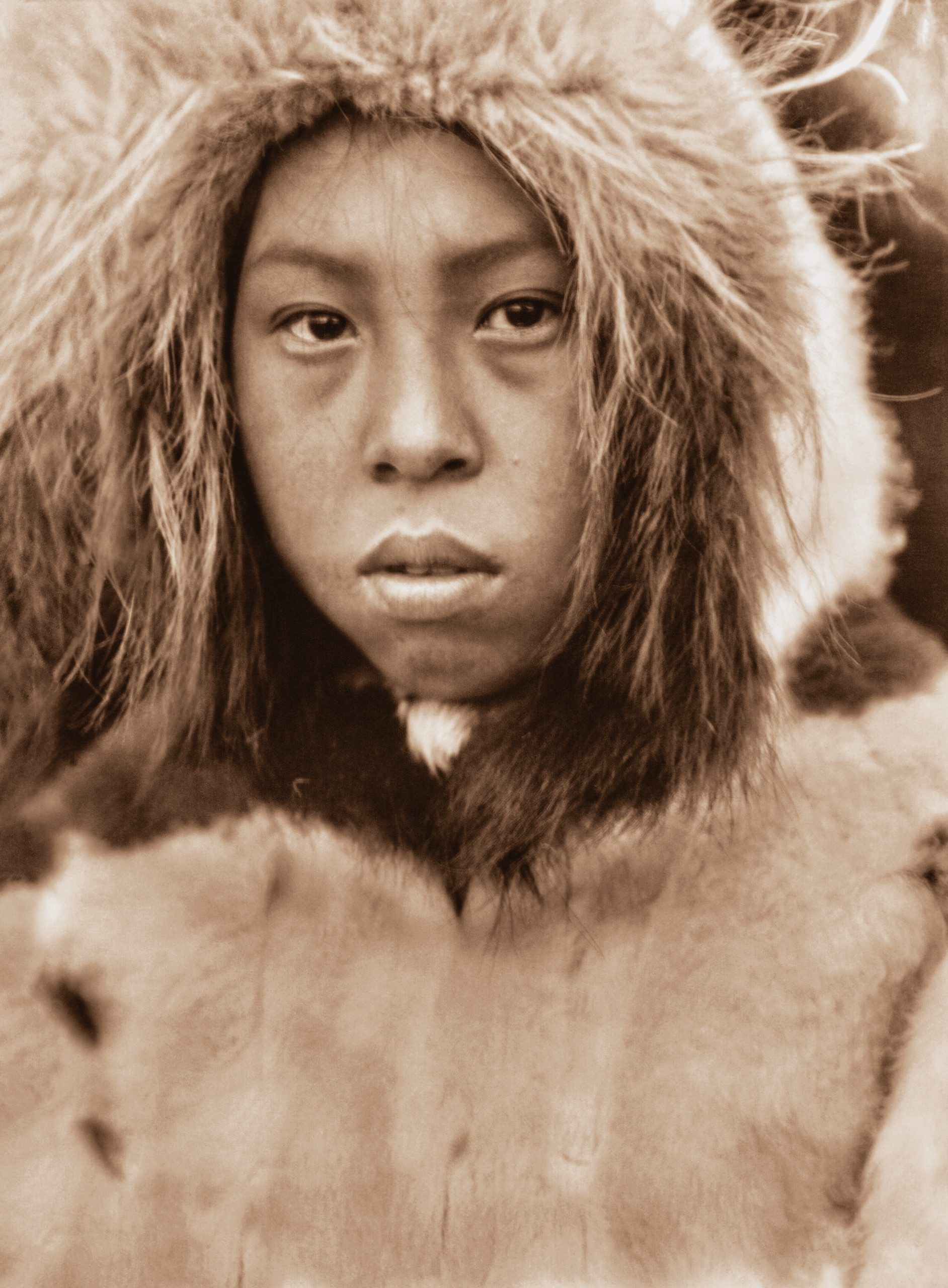 A native from Cape Prince of Wales in a fur parka  is part of the new exhibition. (Photo/Courtesy of the Curtis Legacy Foundation)