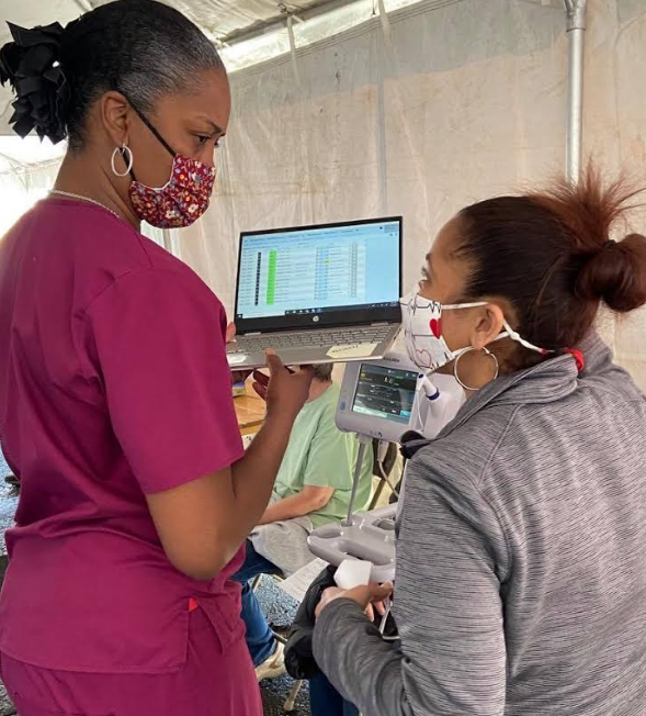 Nurses prepping before the crowd arrives to receive Johnson & Johnson vaccine.