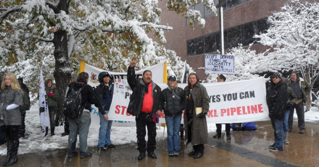 Tom Poor Bear in Denver protesting KXL