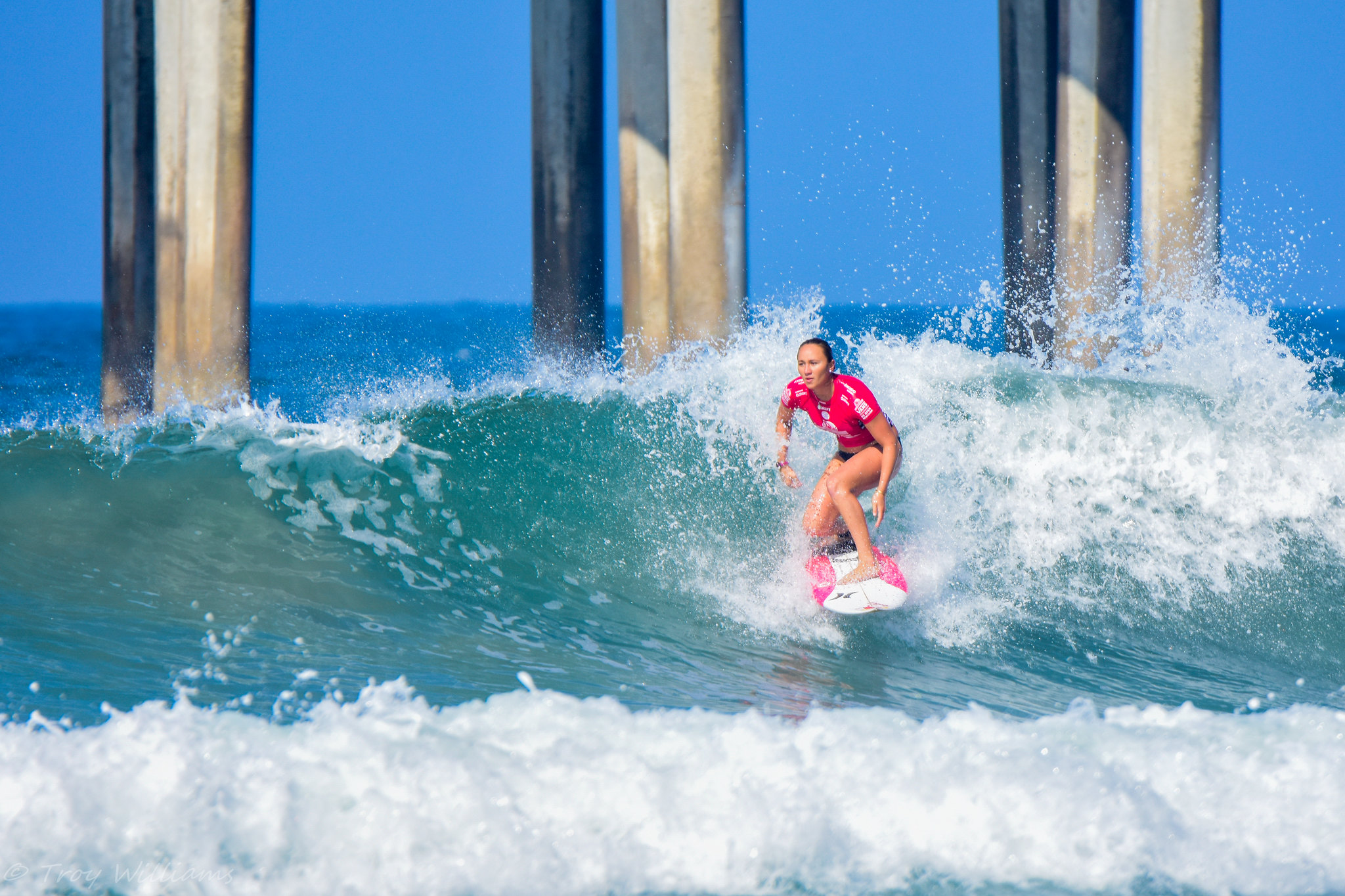Carissa Moore rides a wave on July 26, 2016. Moore became the first Olympic champion in women's surfing at the Tokyo Games. (Photo/Troy Williams, Flickr)