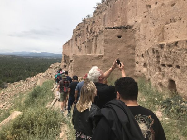 International tourists visit the Pueblo of Acoma.