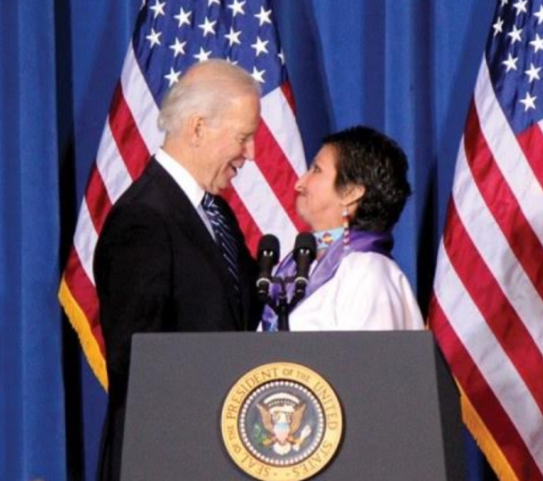 Vice President Biden with Southern Ute tribal member Diane Millich at the 2013 VAWA Reauthorization signing ceremony.