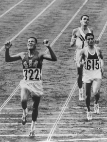 "Every Passion has Its Destiny," Billy Mills (Oglala Lakota), left, winning the gold medal in the 10,000-meter race in the 1964 Tokyo Olympics. Photo courtesy of Billy Mills