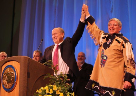 At the swearing in ceremony to become governor and lt. governor of Alaska. Bill Walker (left), Byron Mallott (right) wore his traditional Tlingit attire.