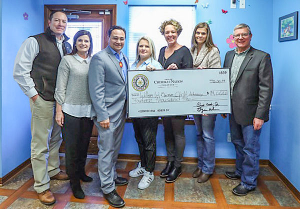 William W. Barnes Child Advocacy Center: (L to R) Cherokee Nation Deputy Principal Chief Bryan Warner, District 15 Tribal Councilor Janees Taylor, Principal Chief Chuck Hoskin Jr., Cherokee Nation First Lady January Hoskin, Children’s Advocacy Center Board of Directors member Julie Osborn, Children’s Advocacy Center Executive Director Holly Webb, District 14 Tribal Councilor Keith Austin.