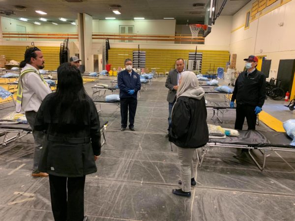 Navajo Nation President Jonathan Nez surveys a converted gymnasium in Chinle, Ariz. that will serve as temporary medical facility to house those stricken with coronavirus on the Navajo Nation.