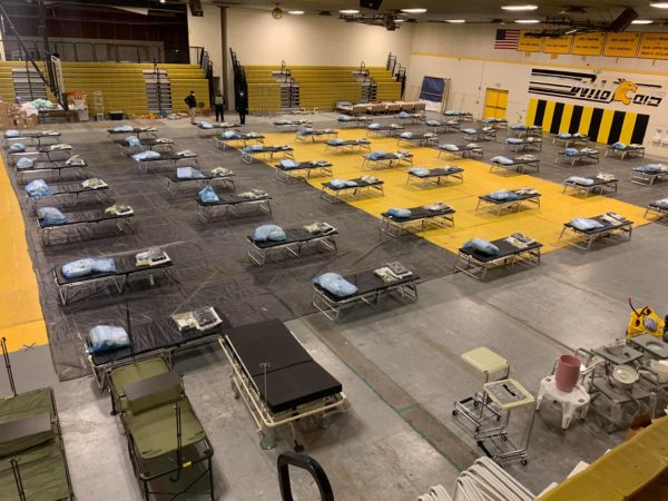 A temporary medical center was set up with 58 beds; similar to FEMA beds used after natural disasters.