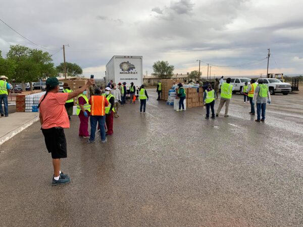 In order to minimize the need for Navajo Nation citizens to shop in grocery stores, the Navajo Nation government has been distributing food and water to families.
