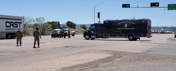 The New Mexico State Police and New Mexico National Guard began diverting traffic at noon on Friday going into Gallup, New Mexico. Photographs by Bronson Peshlaki