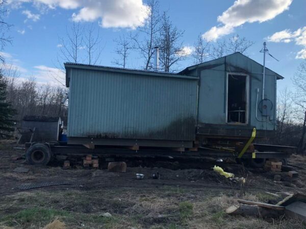 House saved from sinking into the river.