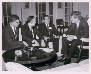 President John F. Kennedy meeting with National Congress of American Indians president Walter Wetzel, Sen. Lee Metcalf and Sen. Mike Mansfield, 1963. (Photo probably by Robert L. Knudsen / National Museum of the American Indian)