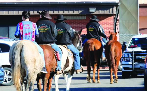 Members of the River Road Indian Relay team, of Dunmore, Montana, escort Selena Not Afraid’s favorite horse, Wart, to the wagon that carried her casket to Fairview Cemetery in Hardin, Montana. Not Afraid went missing on Jan. 1 outside of Hardin. Twenty days later her body was found one and a half miles from where she was last seen. Her death is currently being investigated by the Big Horn County Sheriff’s Office. BHCN photo by Luella N. Brien