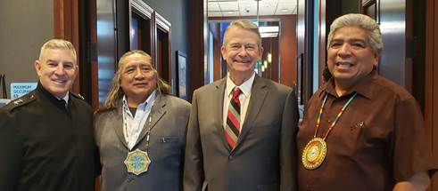 Major General Michael Garshak, Councilman Lee JuanTyler, Governor Little and Chairman Ladd Edmo